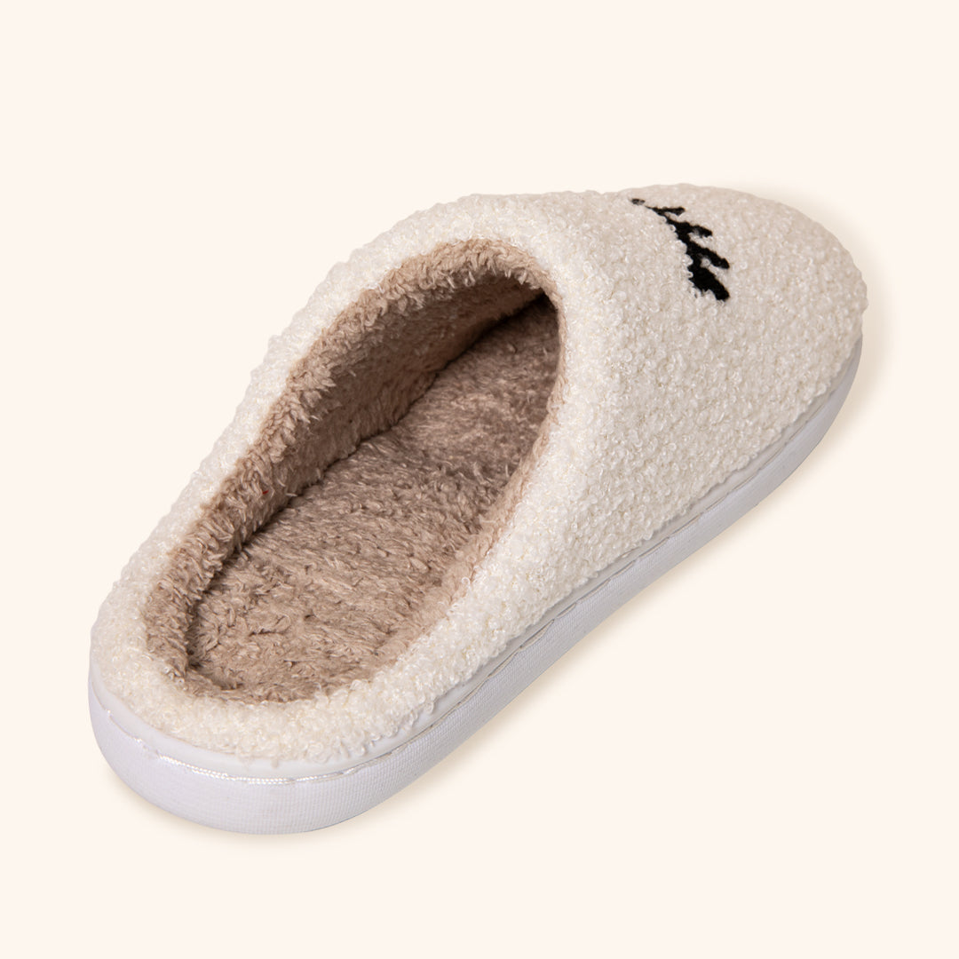 Pantufas de pelúcia aconchegantes com design de pestanas